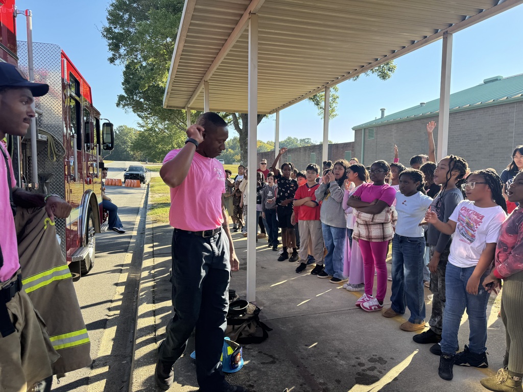Students enjoy a visit from the fire department.