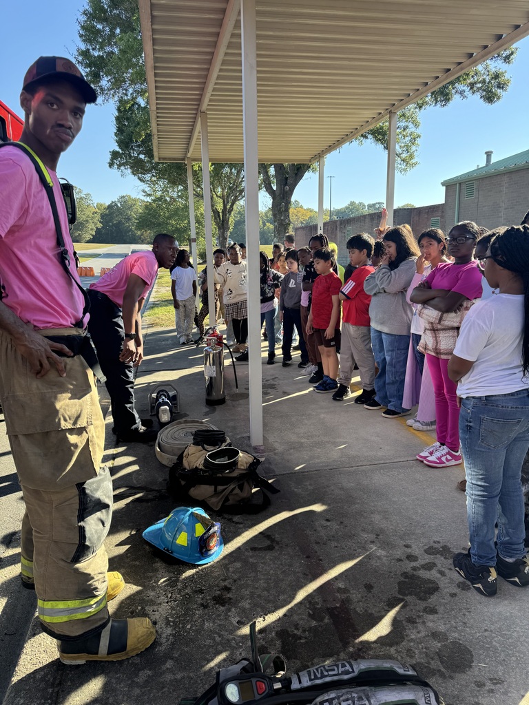 Students enjoy a visit from the fire department.