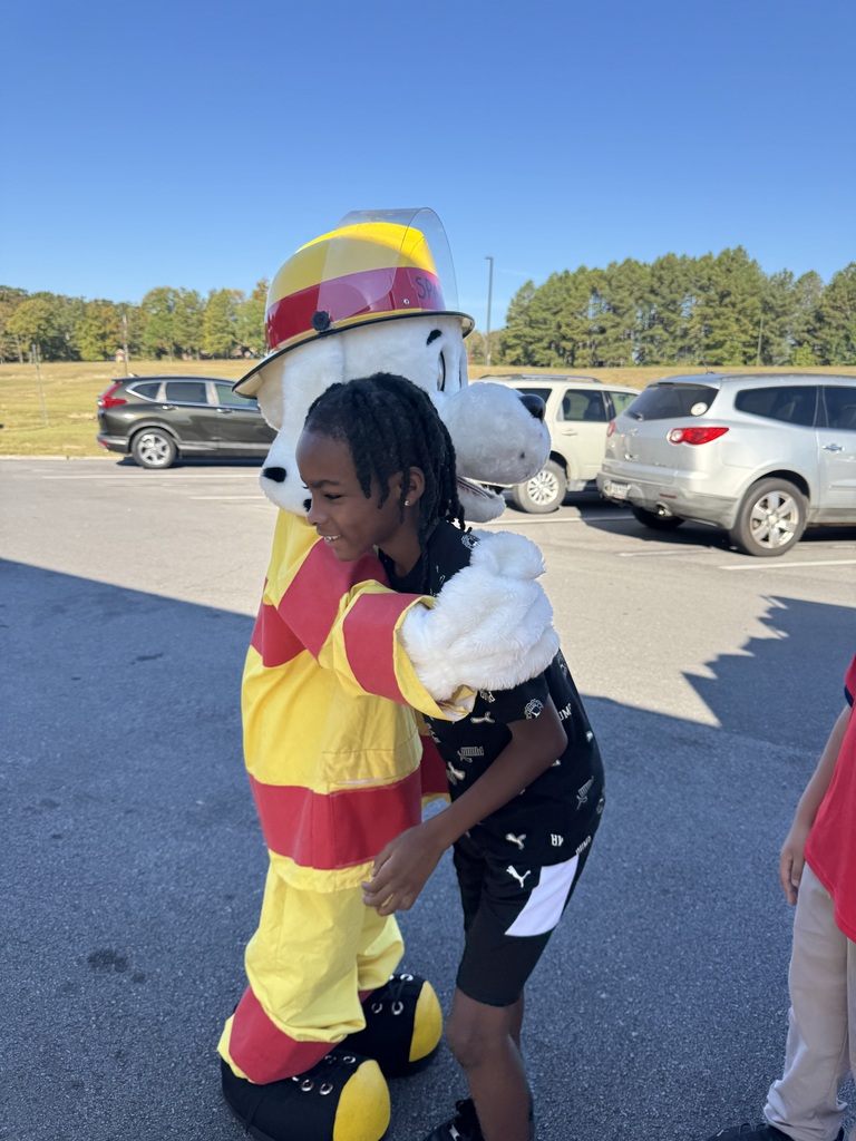 Students enjoy a visit from the fire department.