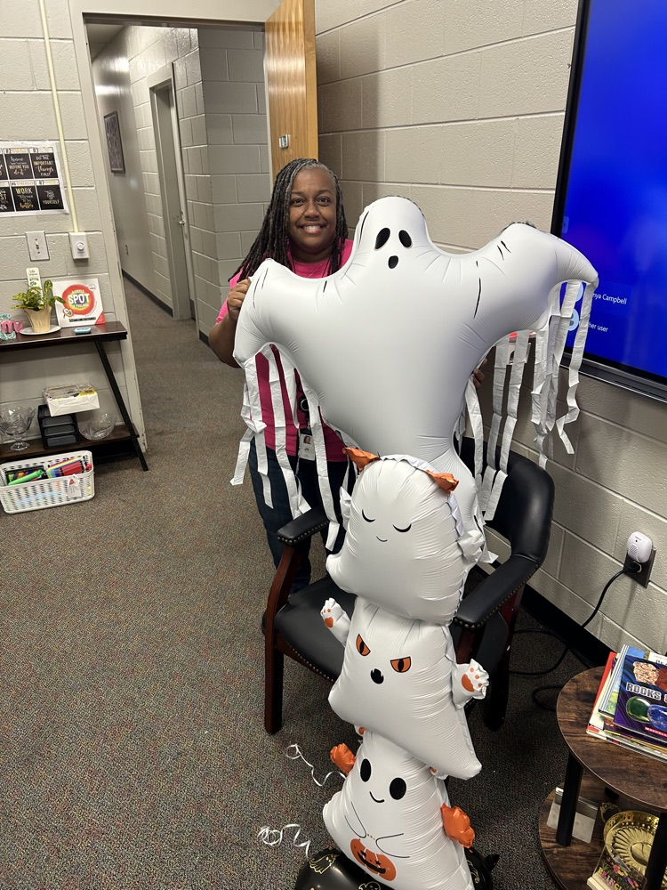 Dr. Campbell poses with her balloons.