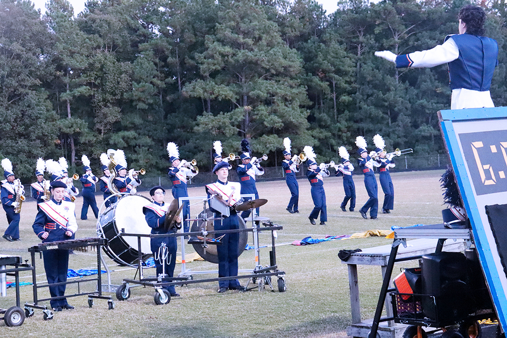 Band practicing on field