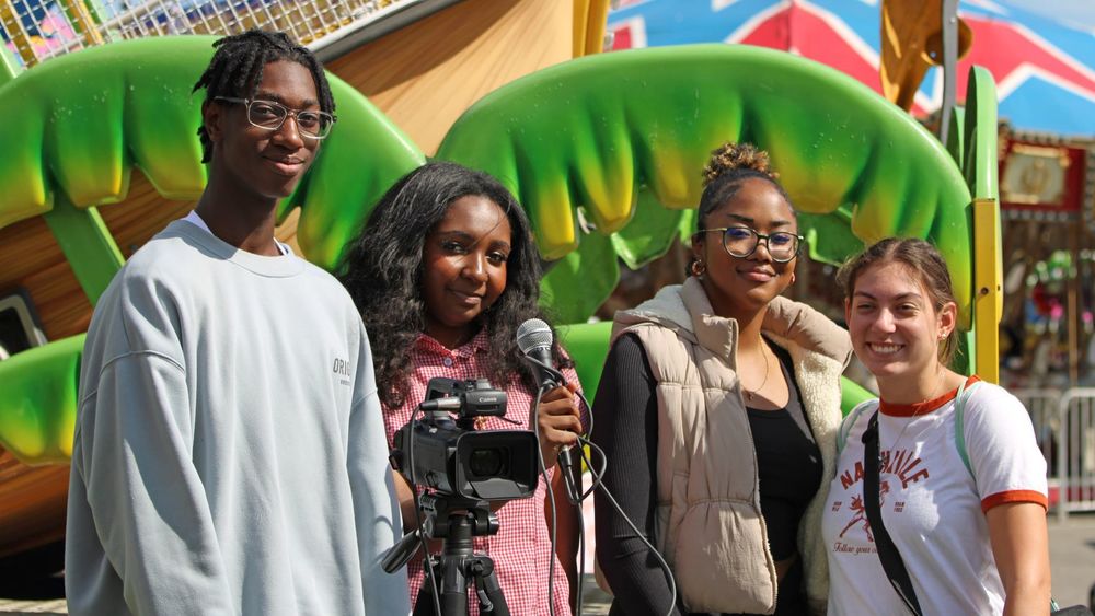Students with a camera at the state fair