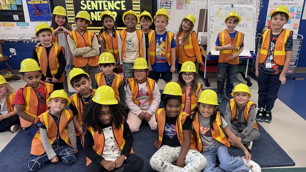 Students in construction uniforms