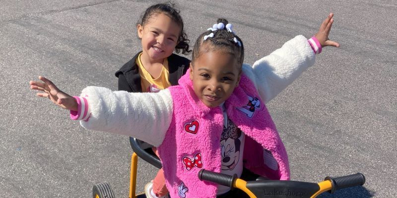 Two girls on the taxi trike