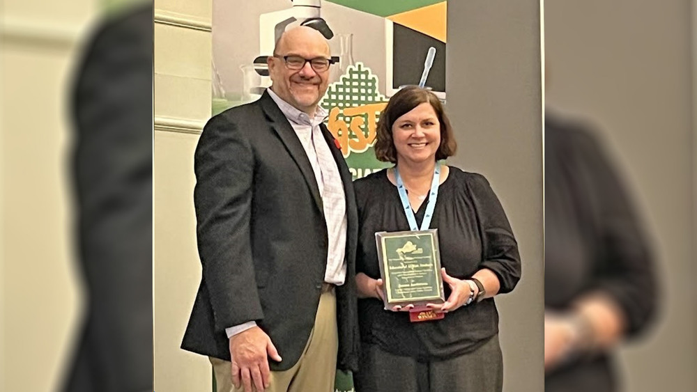 Sue Anderson with her award