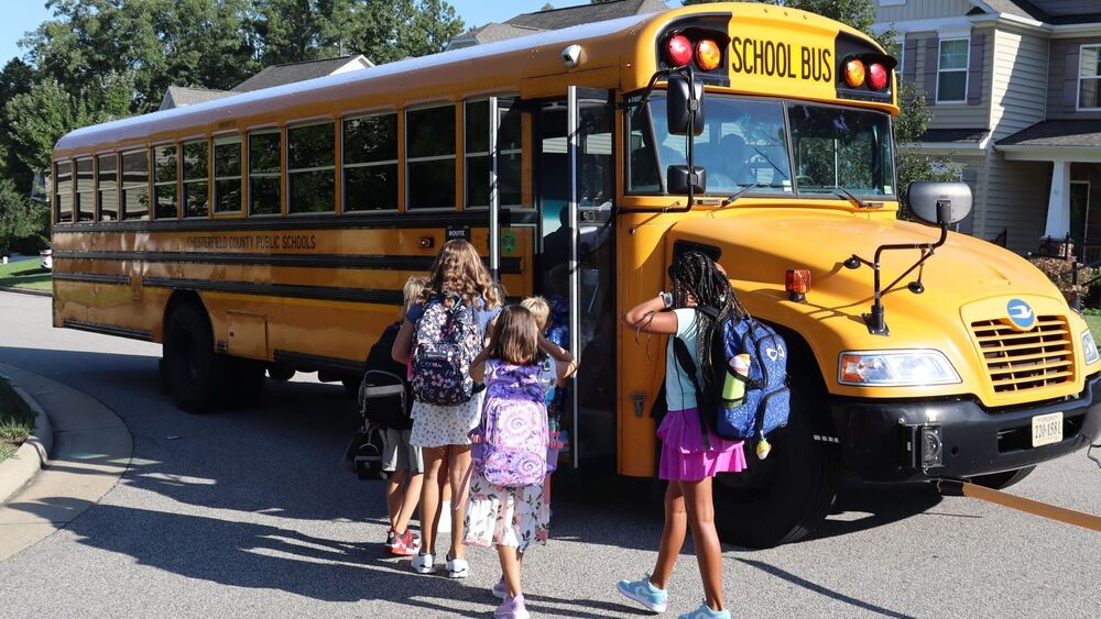 Students boarding a bus