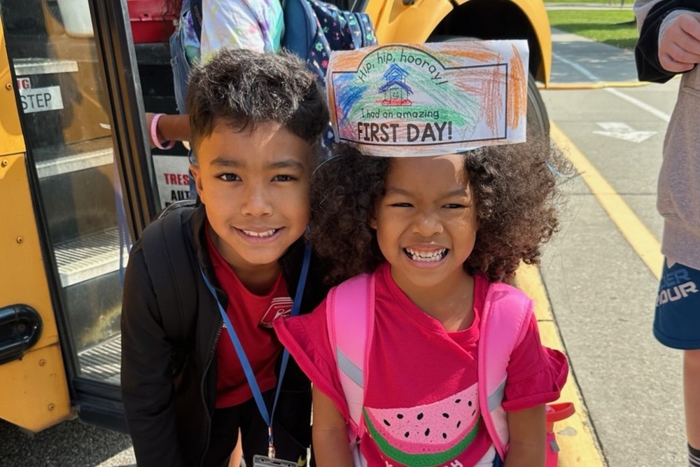Two kids smiling
