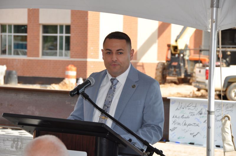 Steven Paranton speaking at a podium