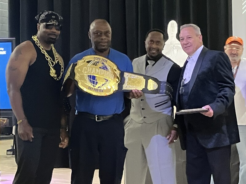 Porter of the year receiving his championship belt