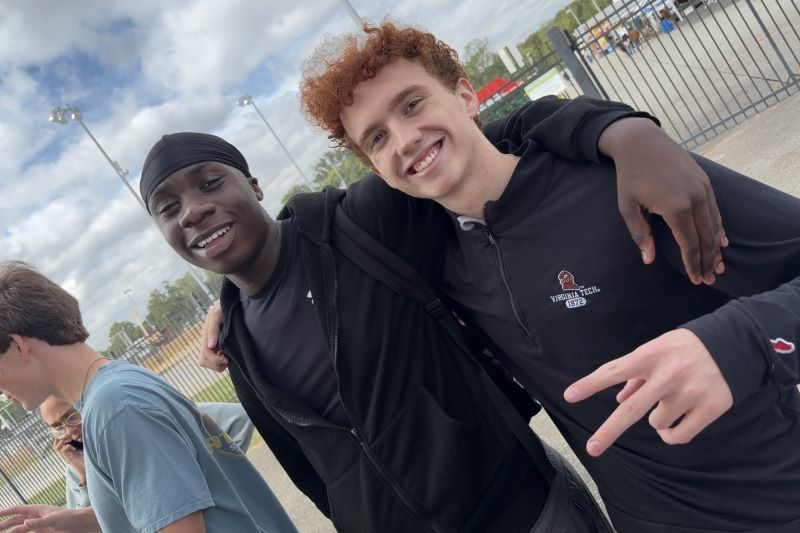 Students smiling at the camera