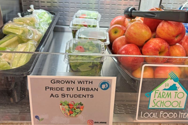 Salad with a sign that reads Grown with Pride by Urban Ag Students