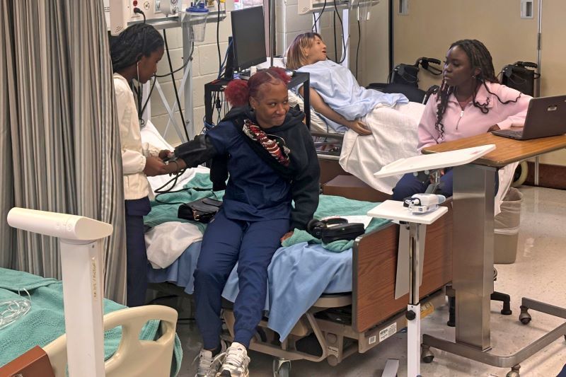 Students performing medical care