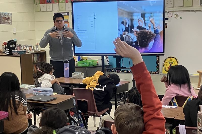 A person presenting to a class