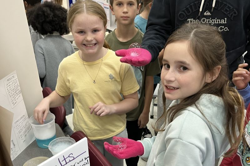 Student with Science Fair project