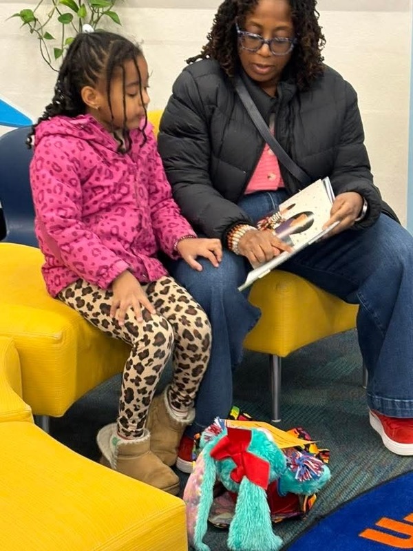 Mother and student reading