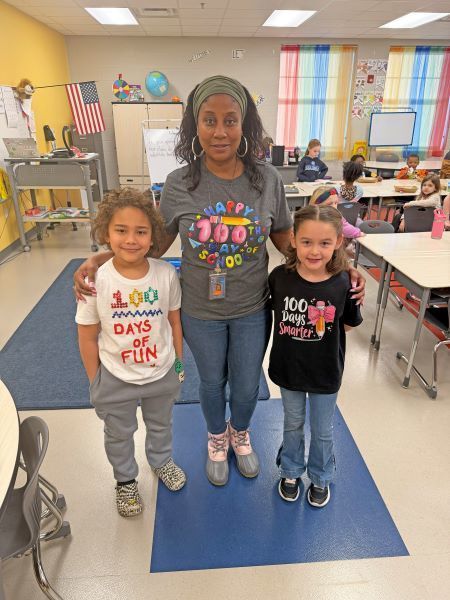 Teacher and students with fun T-shirts