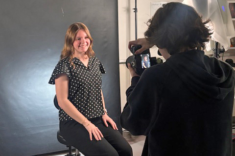 Young woman getting a portrait taken