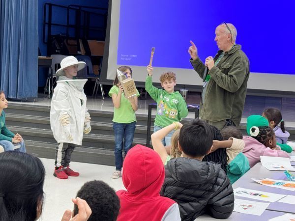 Students learning about bees