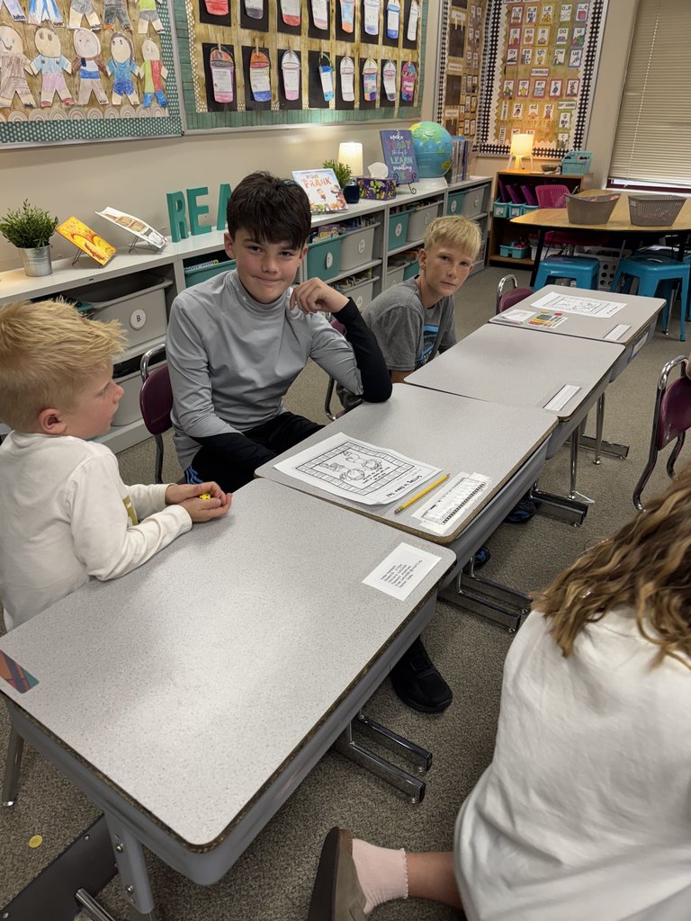 6th Graders with their First Grade Buddies here at GCE!
