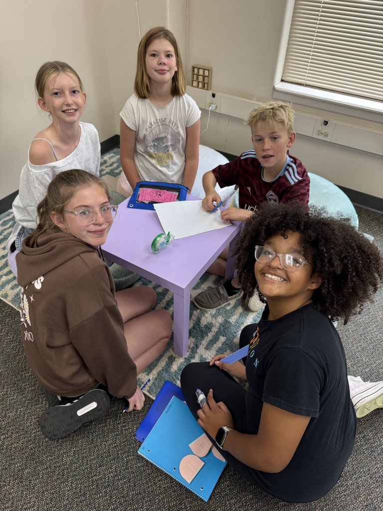 6th Graders with their First Grade Buddies here at GCE!