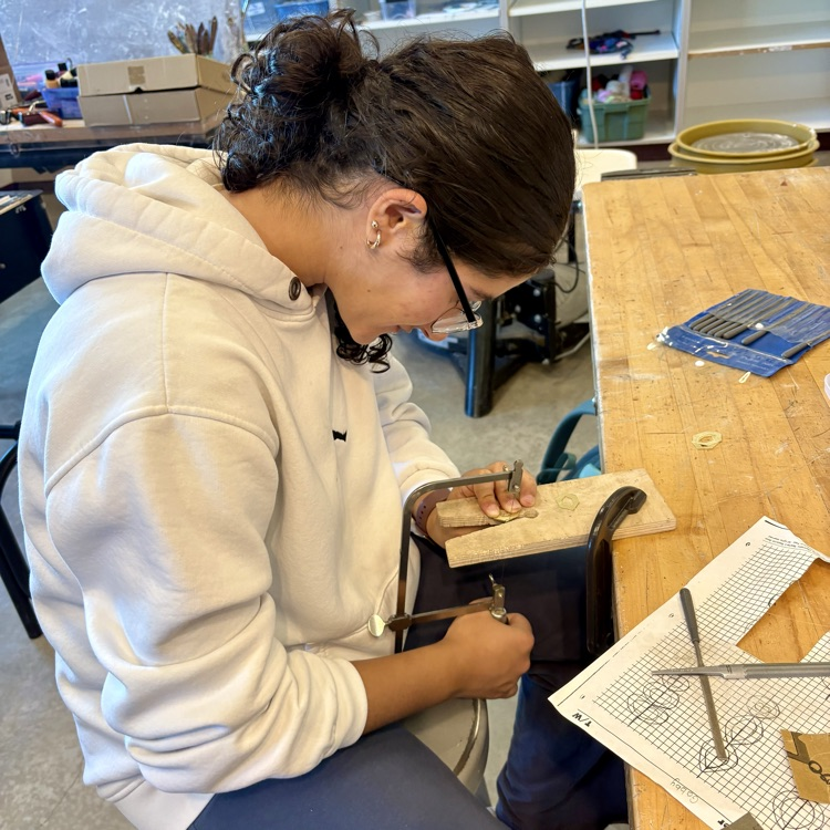 CMHS students engaged in design, art, literature, and music this morning.
