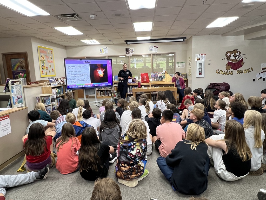 GCE 6th  graders listening to Colorado Springs Fire Department about fire safety and prevention.