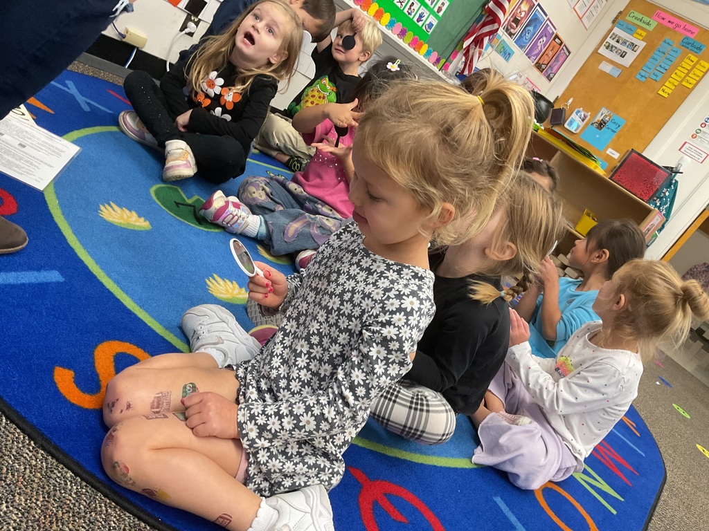 Students being taught a critter crawl lesson