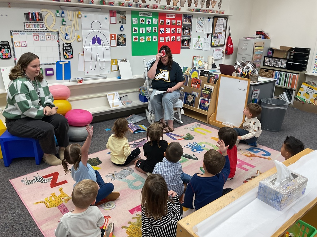 Students being taught a critter crawl lesson