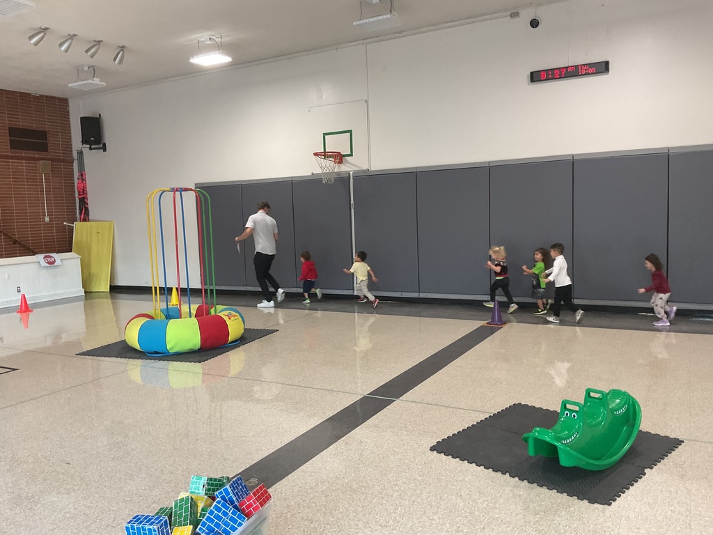 Students being taught a critter crawl lesson