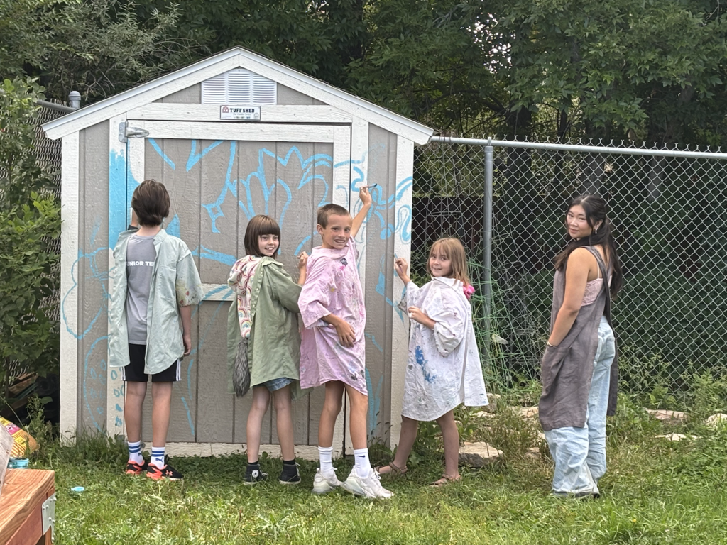 garden shed with art students