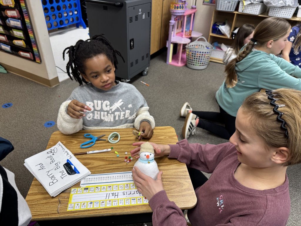 Our GCE Cougars are cozy, creative, and reading-ready! 5th graders shared their snowman stories while kindergartners built their frosty friends.