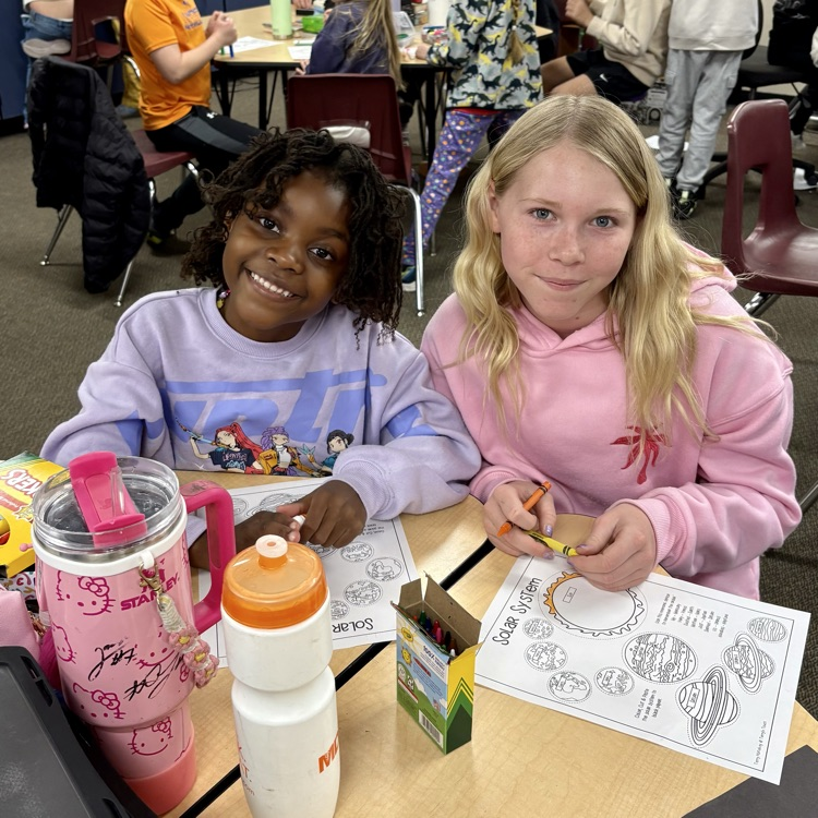 5th graders with their 1st grade buddies working on a special solar system project as part of Space Week at CME☀️🌖🌎🪐