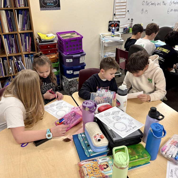 5th graders with their 1st grade buddies working on a special solar system project as part of Space Week at CME☀️🌖🌎🪐