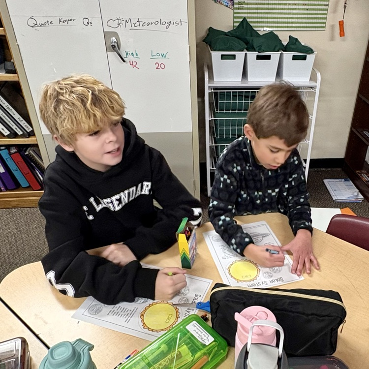 5th graders with their 1st grade buddies working on a special solar system project as part of Space Week at CME☀️🌖🌎🪐