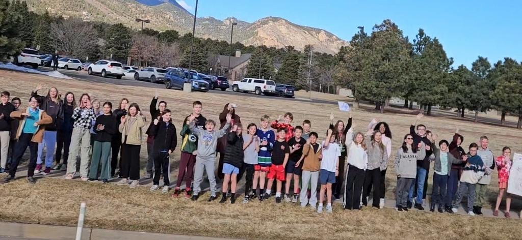 Gold Camp Elementary students and staff packed the sidewalk outside, cheering loud and proud as they sent the CMHS girls swimming and diving state team off to state—Go Hawks!