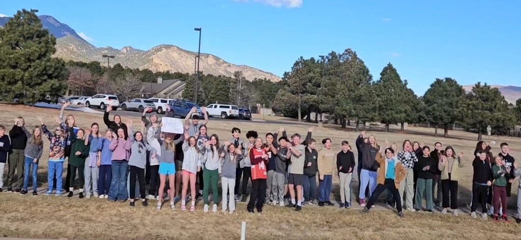 Gold Camp Elementary students and staff packed the sidewalk outside, cheering loud and proud as they sent the CMHS girls swimming and diving state team off to state—Go Hawks!