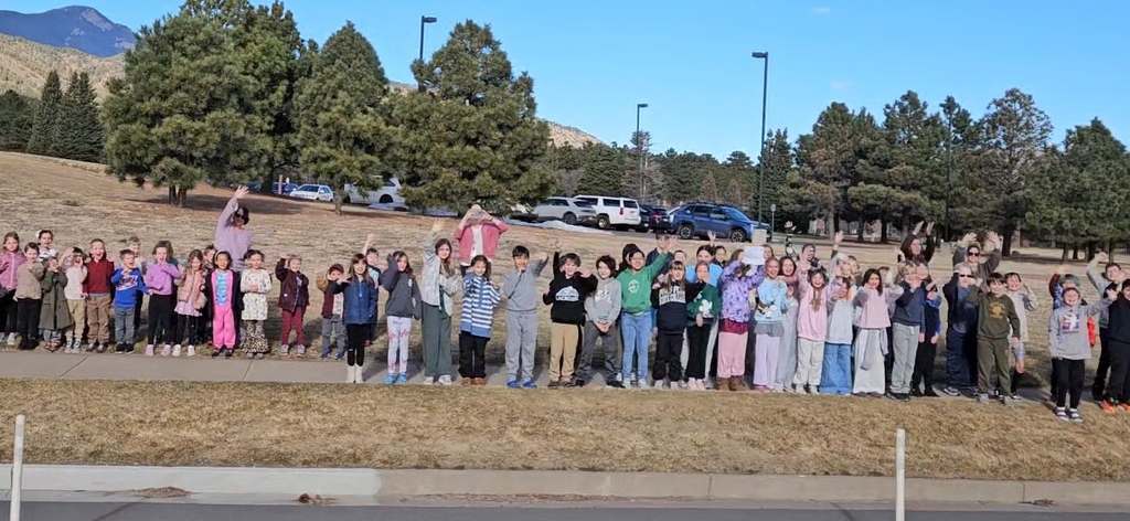 Gold Camp Elementary students and staff packed the sidewalk outside, cheering loud and proud as they sent the CMHS girls swimming and diving state team off to state—Go Hawks!