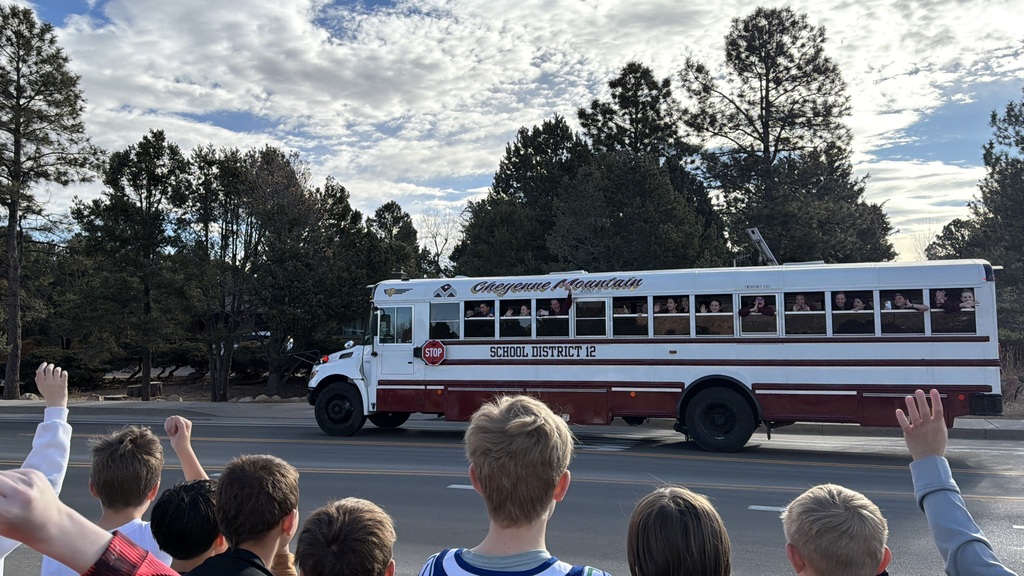 Gold Camp Elementary students and staff packed the sidewalk outside, cheering loud and proud as they sent the CMHS girls swimming and diving state team off to state—Go Hawks!