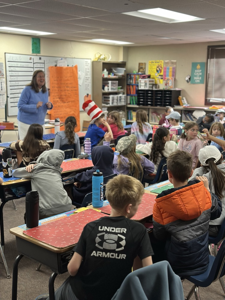 Former BOE President reading to 3rd graders