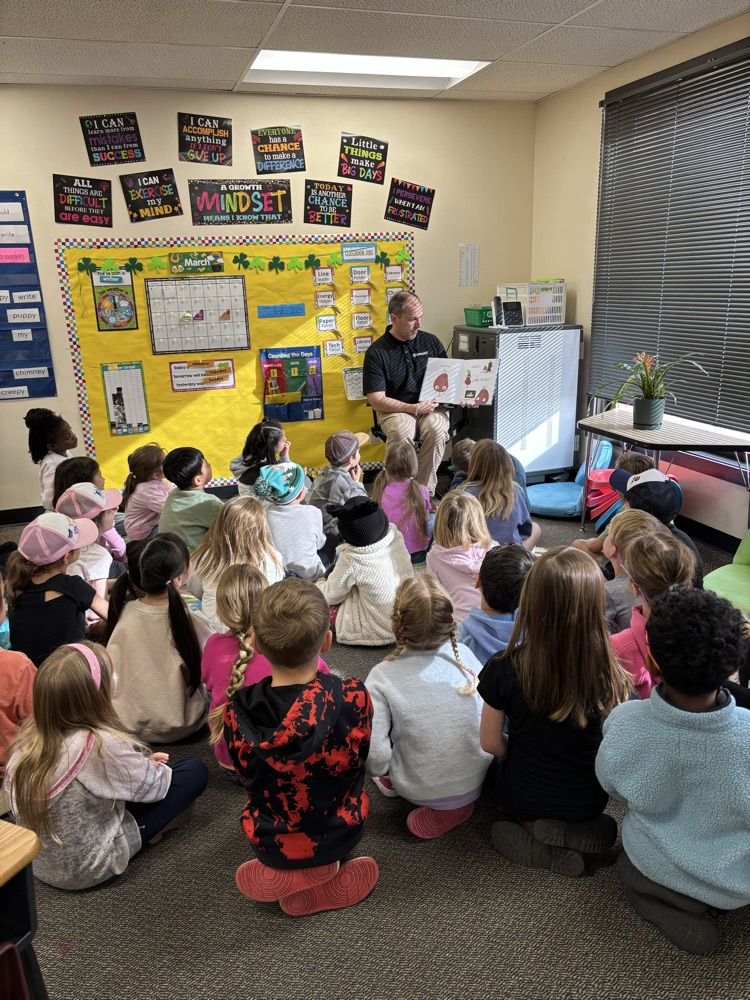 Dr Sobehrad reading to 1st graders