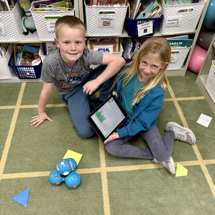 Gold Camp Elementary School 2nd graders engaged in coding and programming robots.