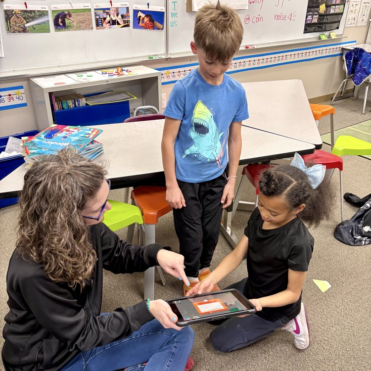 Gold Camp Elementary School 2nd graders engaged in coding and programming robots.