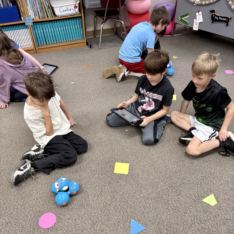 Gold Camp Elementary School 2nd graders engaged in coding and programming robots.