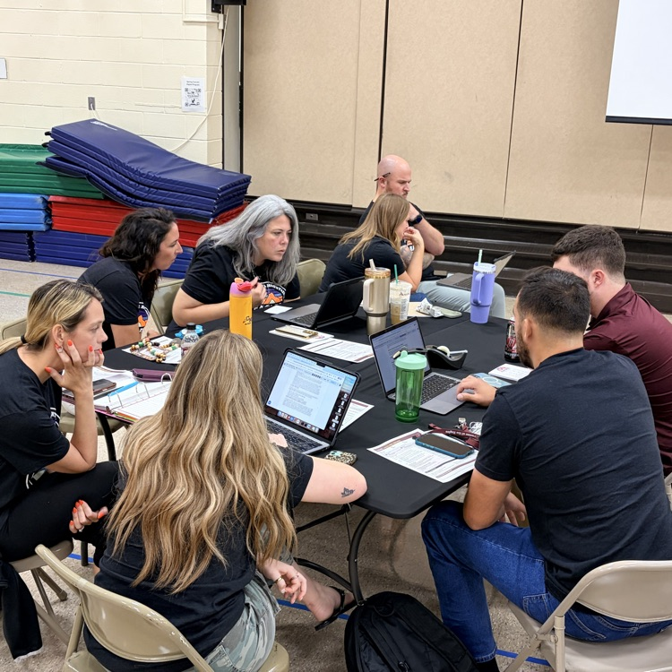 staff collaborating in gym