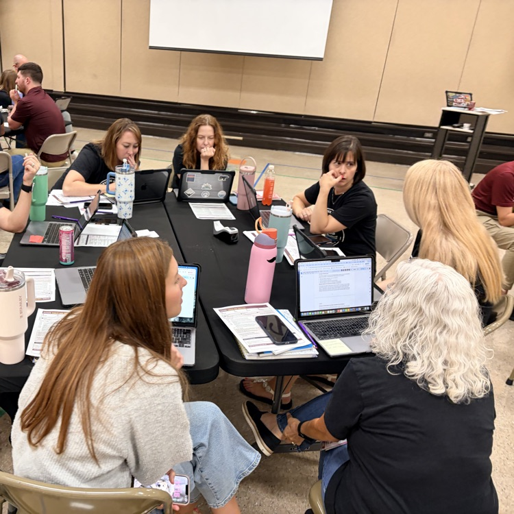 staff collaborating in gym