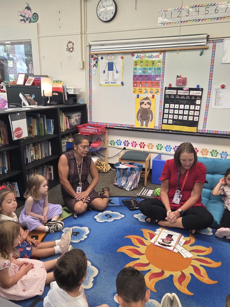 preschool classroom with students and teacher