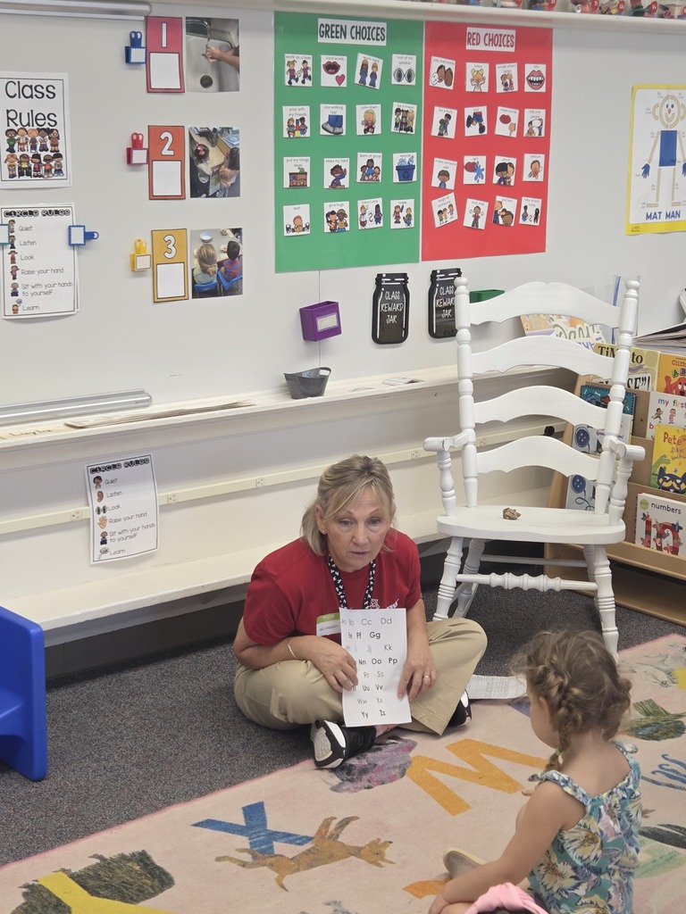 preschool classroom with student and teacher