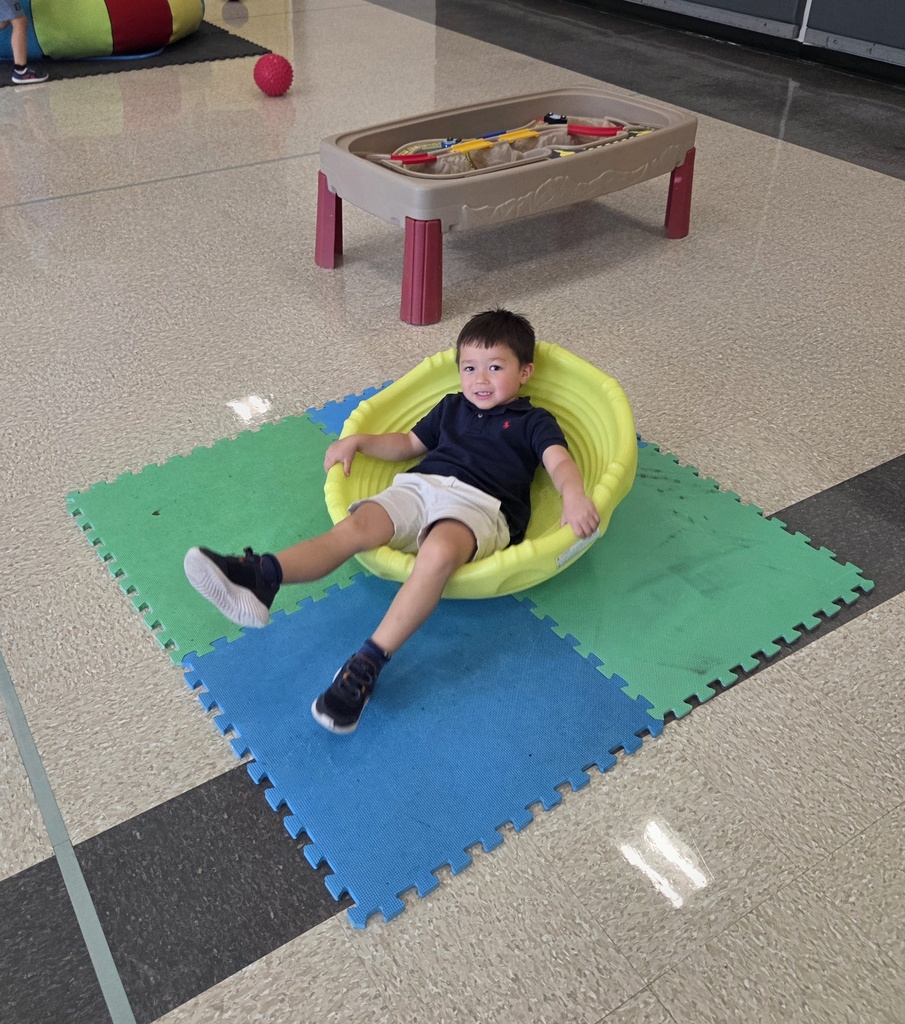 preschool students in chair