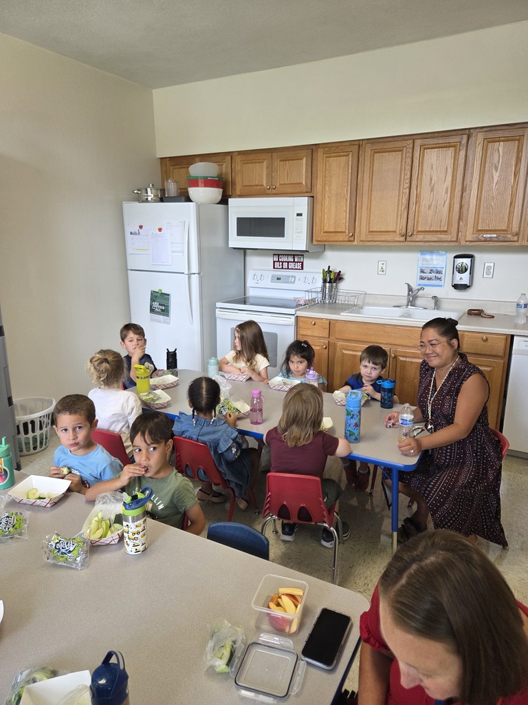 preschool students and teacher