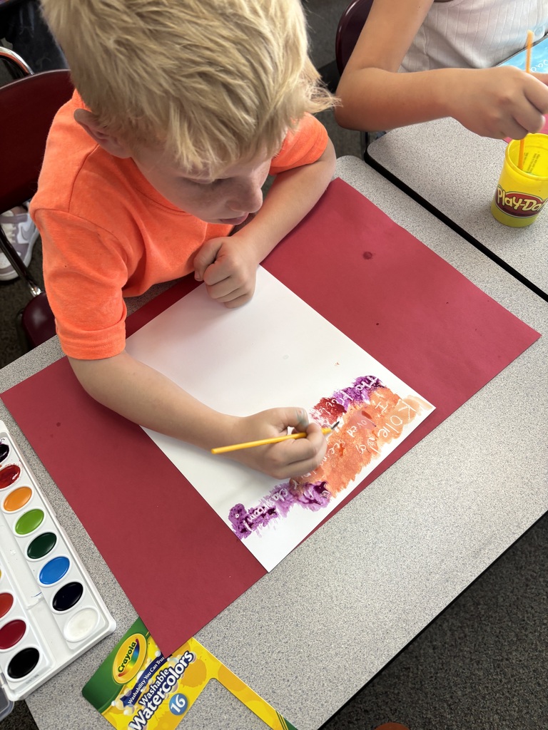 A little Gold Camp Back to School Night magic! Ms. Stoller Lee’s 2nd grade parents wrote secret messages in white crayon, and today their students painted over them to reveal the surprise!